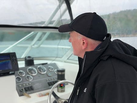 captain driving the fishing boat