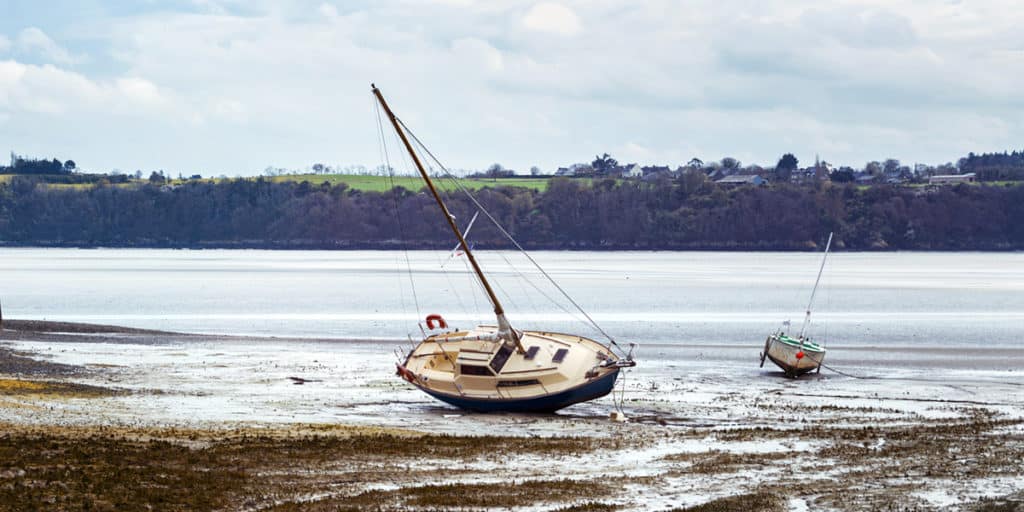 low tide For Cleaning A Boat Bottom hull